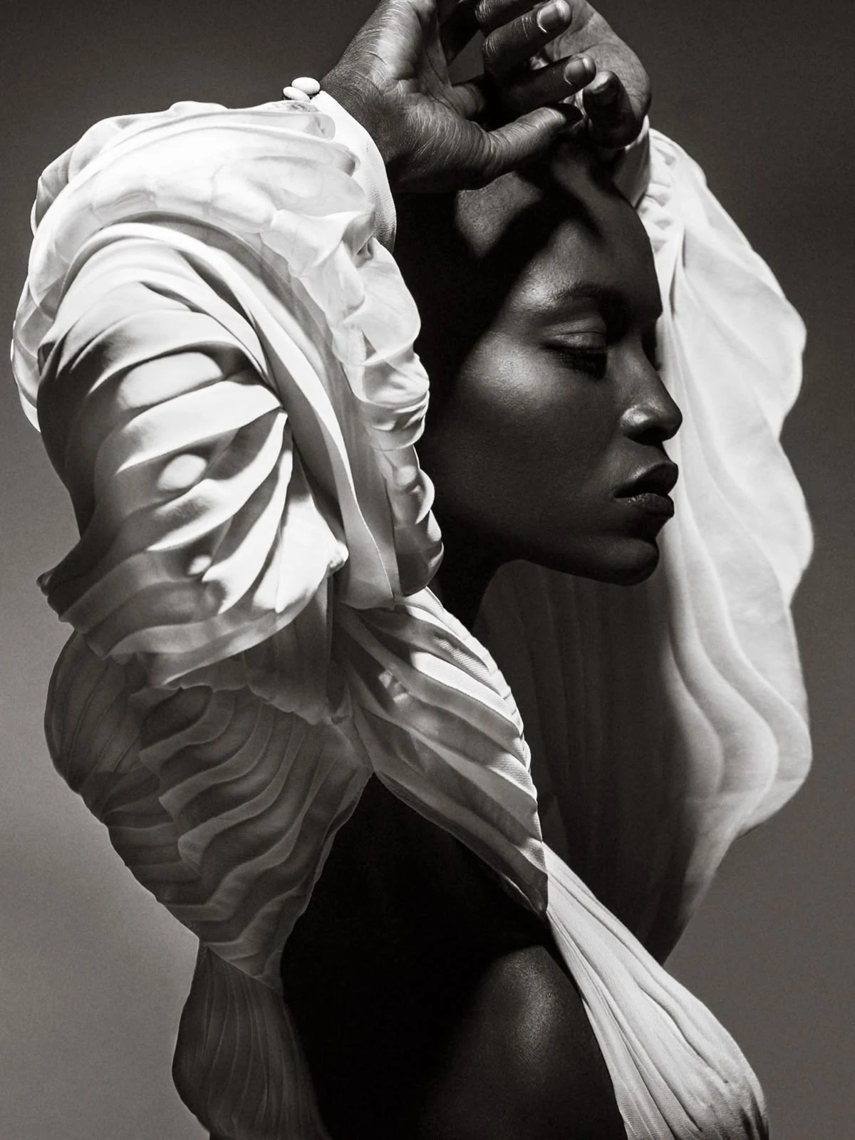 The everyday muse in a dramatic black and white editorial portrait